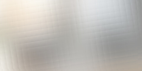 A soft, diffused light illuminates a textured surface with subtle horizontal lines and a gentle gradient from light to dark, creating a serene and abstract background