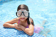 © New Africa - Little girl wearing diving mask in swimming pool. Summer vacation
