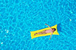 © New Africa - Girl on inflatable mattress in swimming pool, top view. Summer vacation