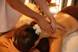 © InfiniteFlow - Caucasian woman customer enjoying relaxing anti-stress spa massage and pampering with beauty skin recreation leisure in warm candle lighting ambient salon spa at luxury resort or hotel. Quiescent