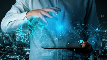 Wall Mural - a businessman interacts with a digital tablet displaying a holographic world map and wireless connec