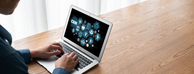Wall Mural - customer relationship management system on modish computer for crm business and enterprise