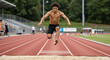 © SvGreen - Athletic young man jumping in long jump competition on track