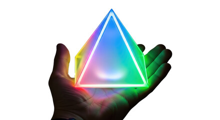Illuminated pyramid in hand glowing colorful light display abstract design modern art object held up close up on transparent background