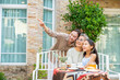 © CandyRetriever  - Portrait of Happy Asian three generation women family enjoy outdoor celebration holiday party at home. Big family spending time together relaxing and have fun weekend activities in the garden.