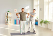 © Studio Romantic - Physical therapy exercise, male patient rehabilitation, physical therapist nurse, traumatologist doctor helping medical sport session to relieve pain, tension, reduce ache after sport injury, health