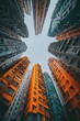 Urban cityscape view looking up at densely packed high-rise buildings