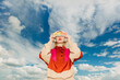 © VISTA by Westend61 - Retro woman in vibrant sportswear listening to cassette music outdoors
