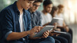 © Kateryna Arkhypova - Students use tablets, the modern scene illuminated by soft light. Students, tablets, with copy space