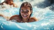 © Vitalii - young pretty woman on the inflatable ring having fun on the orange water slide in the aqua park. Summer Vacation. Weekend on resort