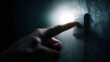 © Thares2020 - Hand flipping light switch in a dark room