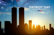 Silhouette of the New York skyline with Twin Towers against the sunset with USA flag. September 11, 2001. American Patriot Day banner. We will never forget