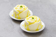 © Aksana - Vegan Lemon cream pudding, in the shape of a rose, with sauce