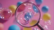 © Aris Suwanmalee - A magnifying glass focuses on soap bubbles against a colorful background.