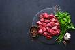 © lilechka75 - Raw organic meat cubes ( beef or lamb ). Top view with copy space.