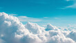 © Another Dimension - fluffy white clouds covering blue sky natural background