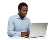 © Creative Design - Focused black man working on a laptop computer typing on keyboard isolated on transparent background