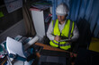 © akarapon - A specialist inspector is planning a serious structural inspection of a large office building.