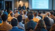 © VistaVisions - Rear view of blurred audience listens lecturer at public company workshop. Corporate professional coaching, academic convention concept