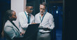 © peopleimages.com - Talking, it support and people with tech in server room for cybersecurity, diagnostics and network. Team, meeting and workers on laptop, tablet and hardware for system update, database and backup
