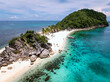 © AmazingAerialAgency - Aerial view of vibrant turquoise waters meet pristine white sands and lush greenery on this tropical island paradise, Gigantes Islands, Carles, Philippines.