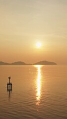 Wall Mural - Aerial view of the golden light on sea surface,Amazing waves ocean at sunset or sunrise sky background