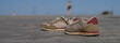 © Norbert Kiel - Sportschuhe am Strand