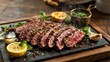© NATALIIA - Marinated flank steak sliced and seasoned with peppercorns on dark slate board, grilled beef with lemon garnish and fresh herbs, steaming presentation