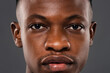 © Atstock Productions - Close up portrait of African man face with eyes looking at camera showing strong expression and authentic detail