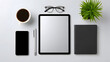 © pkproject - A neatly organized office desk with digital devices and accessories. long_title:A minimalist office desk setup featuring a digital tablet, coffee