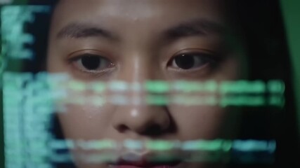 Person examining computer code close up