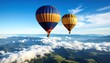© Aldi - Two hot air balloons float over mountains, clouds, and trees on a bright sunny day