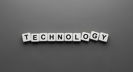 Image of the word TECHNOLOGY spelled out in white letter tiles on a gray background.