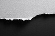 © ttonaorh - Ripped beige paper on black textured background with placeholder text, perfect for design mockups, presentations, or artistic layouts.