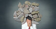 © Westend61 - Businessman with head in hands under heavy burden symbolizing crisis and stress