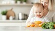 © Po - A joyful moment between a mother and her baby, as they engage with fresh fruits and vegetables in a bright kitchen setting.