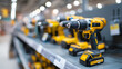 © Kateryna - Neatly organized power tools displayed on retail shelving with bright LED lighting showing cordless drills circular saws and impact drivers with price tags and promotional