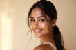 © Vadym - Beautiful Indian woman with long dark hair, radiant skin, bright smile. Hair styled elegantly, framing face with clear, healthy complexion. Looks fresh, fashionable, embodying modern beauty, purity.