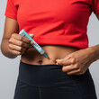 © Mariia - GLP-1 injection with a pen device, for health management, weight control, and diabetes care