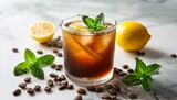 refreshing summer espresso tonic with mint and lemon served over ice on a marble surface surrounded by coffee beans