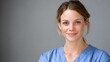 © Johannes - portrait of a young friendly female nurse or a doctor no logos no brands ar 169