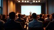 © Ravinan - Corporate seminar with business audience listening to keynote speaker