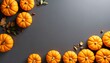 © Adobe - Autumn pumpkins frame with grey background.