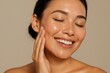 © Jelena - Radiant woman celebrating flawless skin after professional beauty treatment