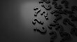 © Chainarong - Scattered black question marks on a dark reflective surface creating a background of mystery and unanswered questions