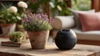 © studio - Outdoor speaker beside lavender plant on wooden table