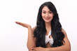 © Royaltyfreecliick - Smiling Woman Presenting Copy Space