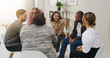 © Jordi P D/peopleimages.com - Support, group counseling and happy people in circle for addiction recovery. Psychology, men and women together for therapy session, help or talking for alcoholic rehabilitation in community center