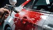 © AiStock B - Car painting process using spray gun for auto refinishing and custom automotive paint job service