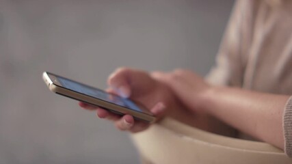 close-up using internet social media apps at home. Shopping online using smartphone touch screen typing scroll